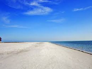 Wide white sandy beach